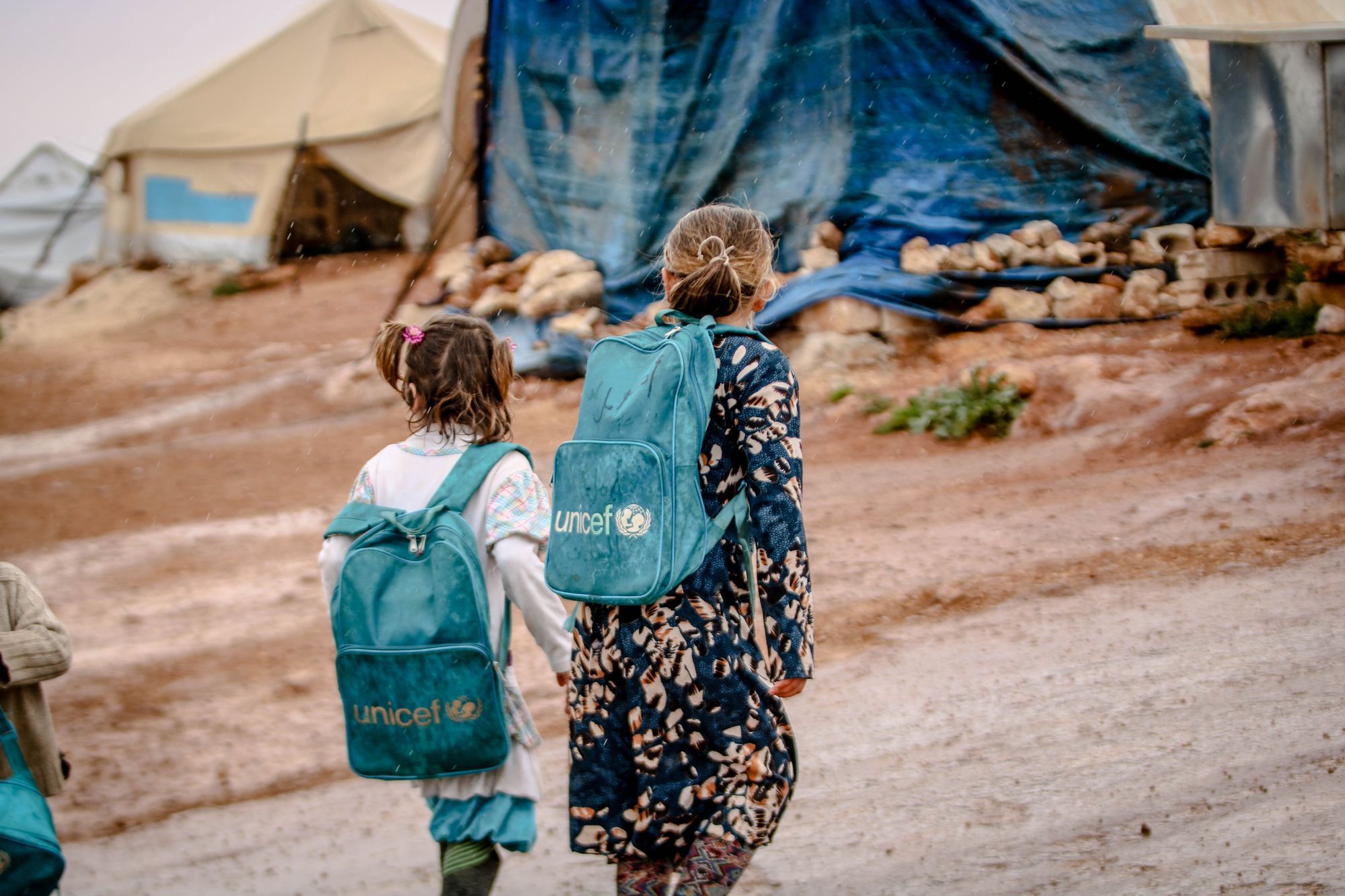 Aid workers offering support to a family.