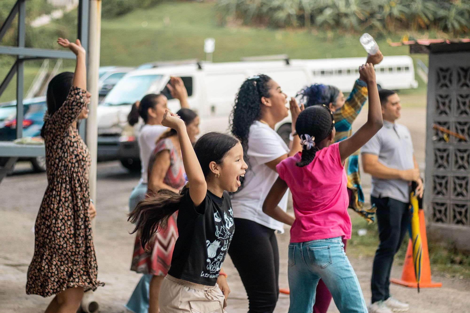 A community gathering to celebrate together outdoors.